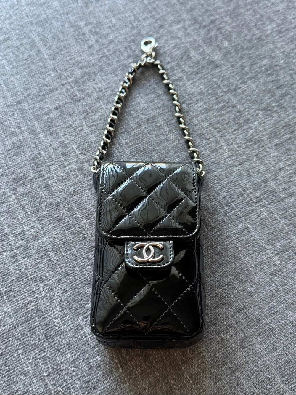 CHANEL Black Patent Leather Quilted Phone Case with Silver Hardware